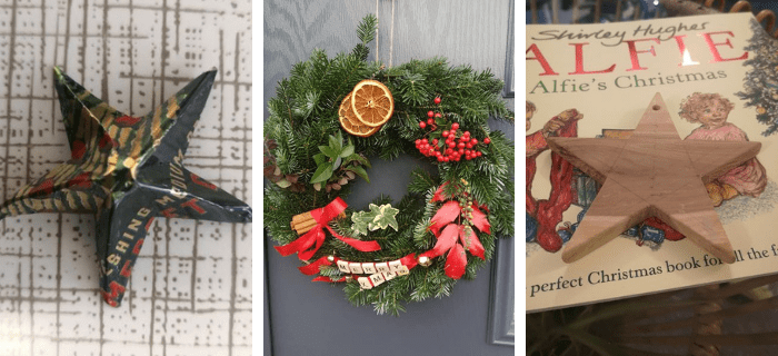 A star made out of paper, a Christmas wreath and a star made of wood