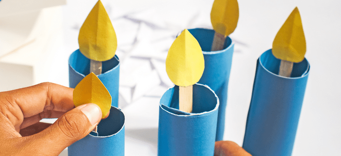 Homemade Hanukkah decorations: blue candles made from card