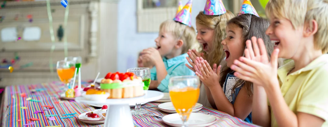 Children laughing at a party