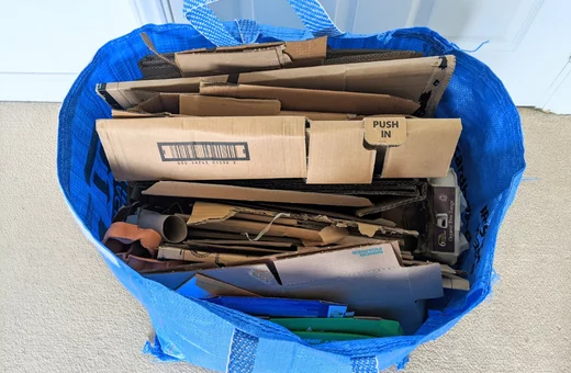 A full Bristol Waste blue bag for card and brown paper
