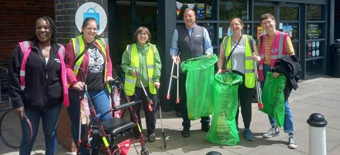 The Coop litter pickers, 6 people, standing outside a Coop store