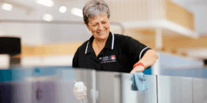 Woman cleaning an office