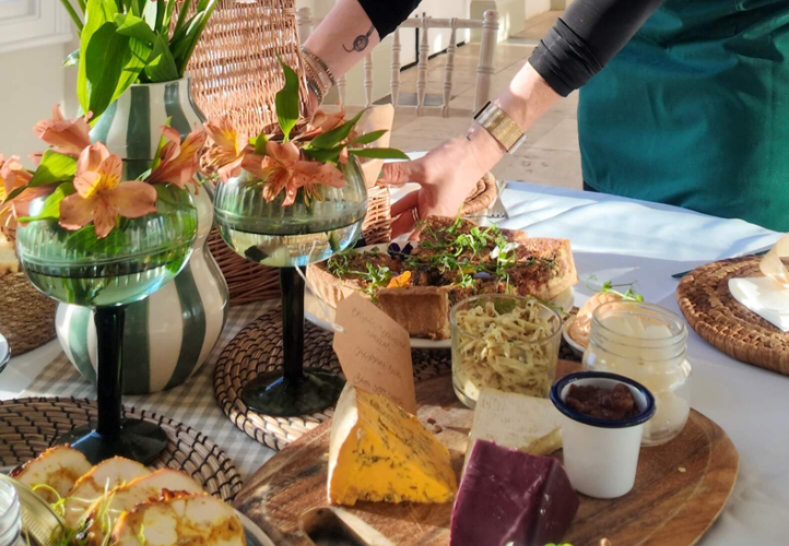 Food and flowers presented on a table