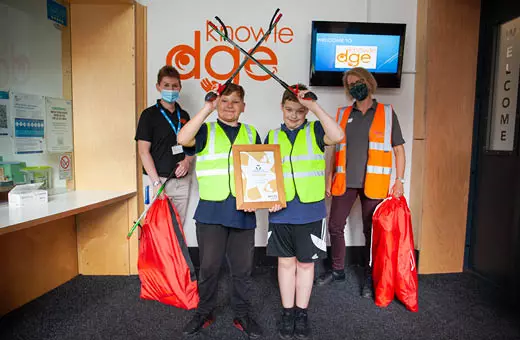 Winners showing their certificate