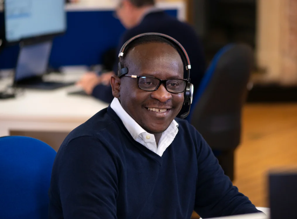 Man wearing headset smiling