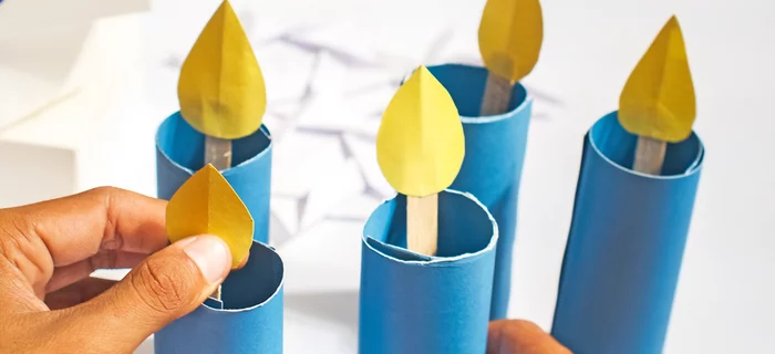 Homemade Hanukkah decorations: blue candles made from card