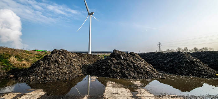 Lines of piled up organic waste about 2 meters tall