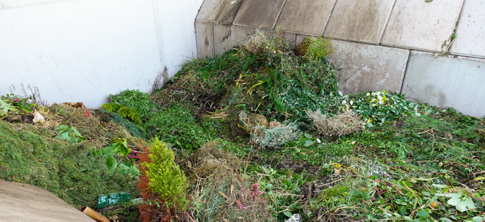 Garden waste piled up in the recycling centre