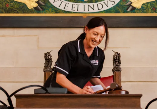 Woman cleaning desk