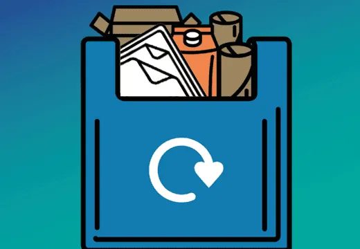 a blue recycling bag with paper, card and cartons inside