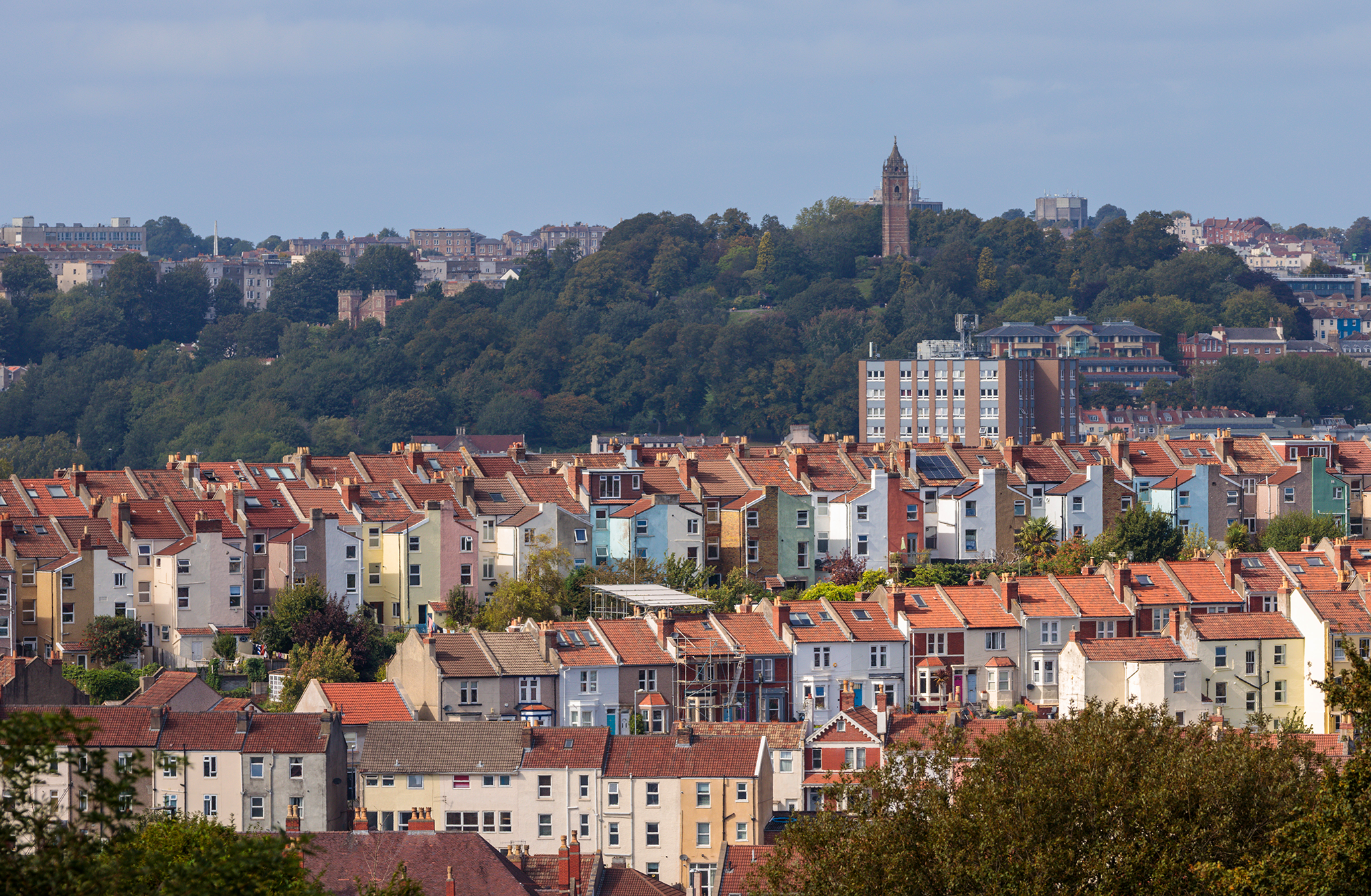 A wide shot of Bristol houses with Brandon Hill Tower on the horizon