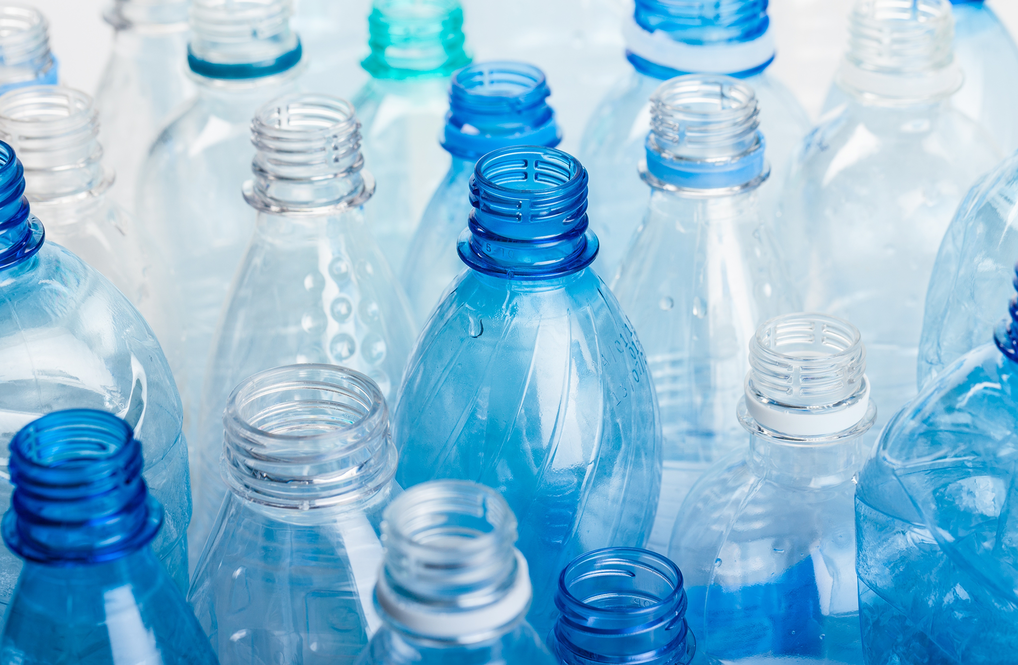 Blue and clear plastic bottles