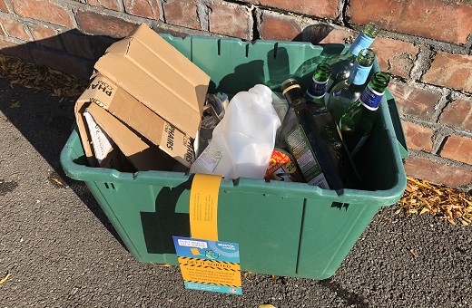 Badly sorted Bristol recycling box with a Get it Sorted flyer on