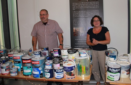 Community RePaint team at Reuse sale selling paint