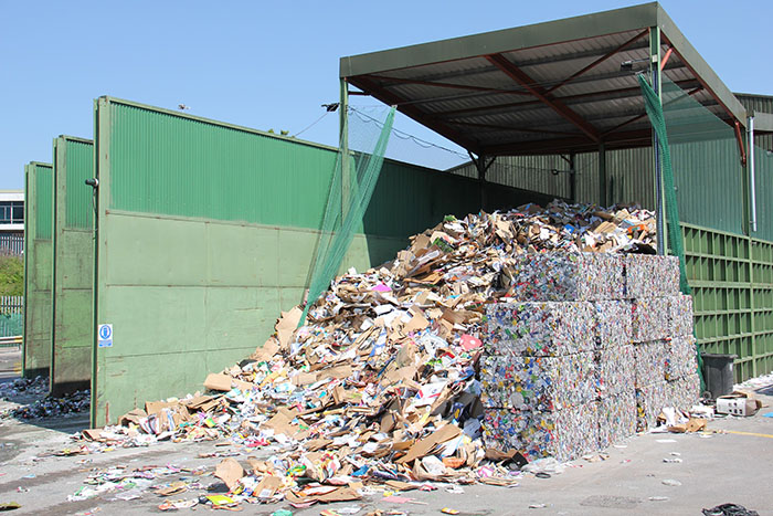Cardboard recycling and bales at the Bristol Waste transfer station