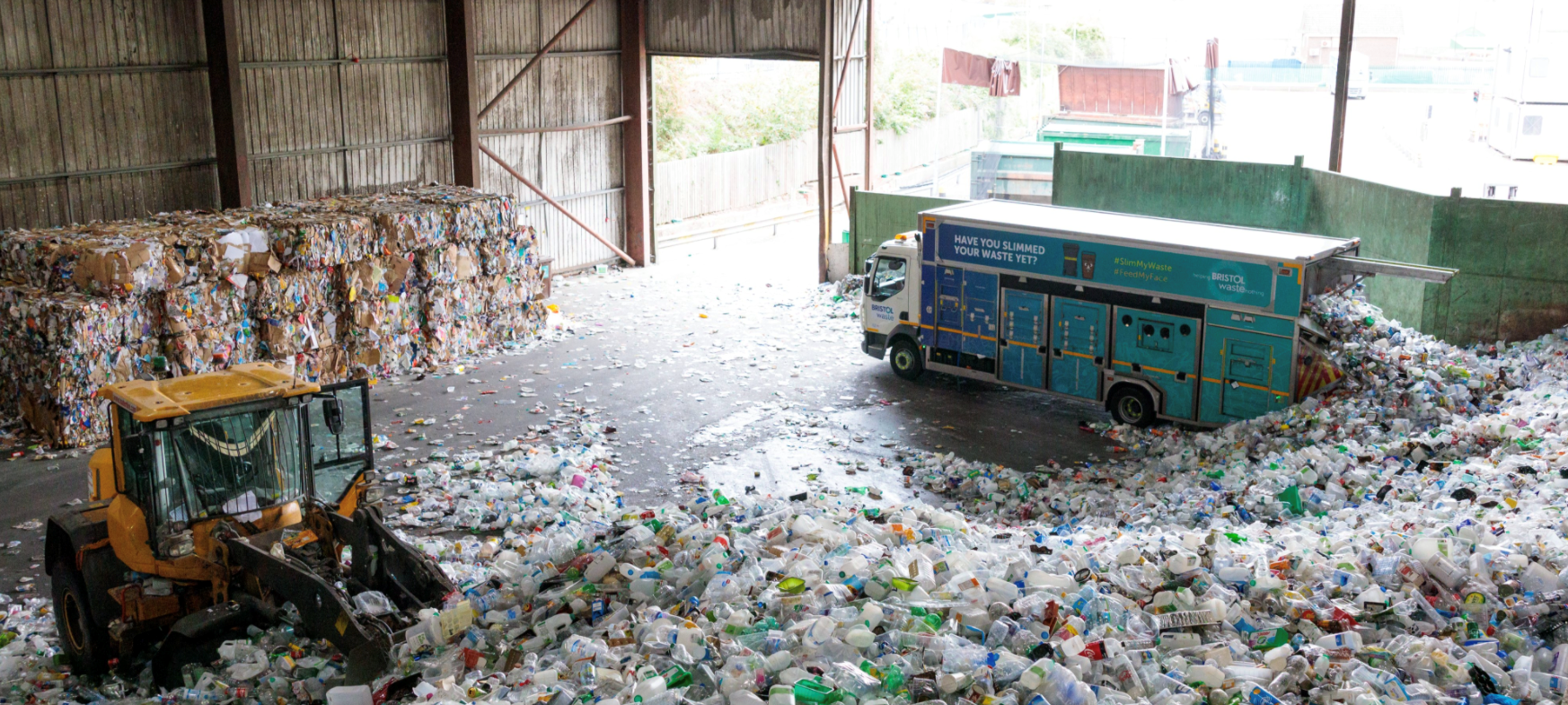 bristol waste recycling truck unloading plastics at the transfer station