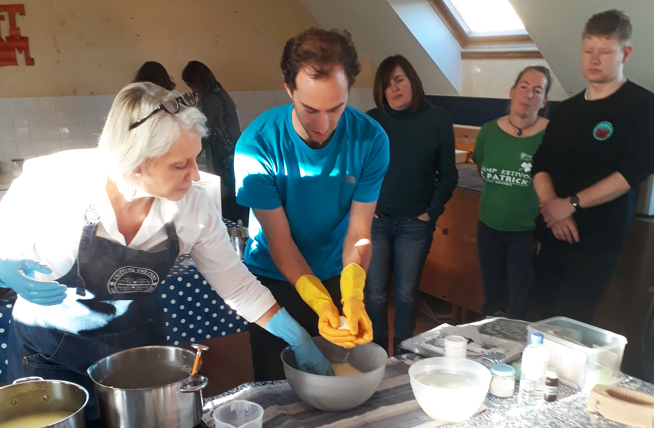 Participants at a cheese making workshop