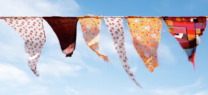 Fabric bunting against a blue sky