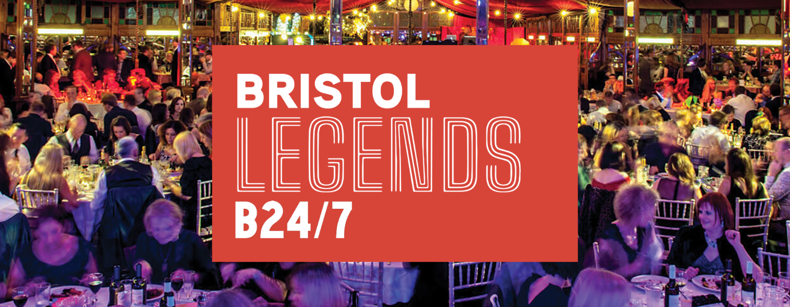 People celebrating at event with the logo Bristol Legends B24/7