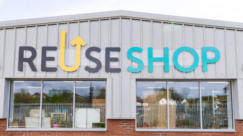 Reuse Shop letters on a warehouse building