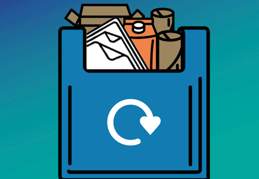 a blue recycling bag with paper, card and cartons inside